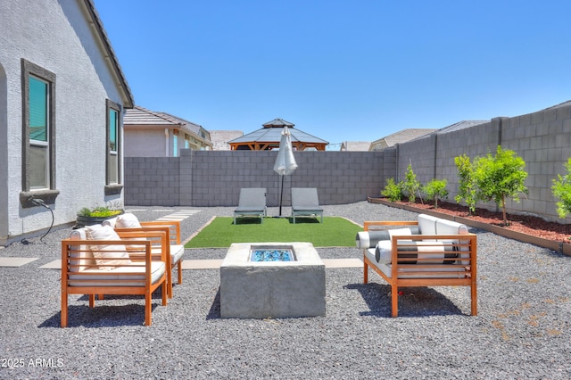 37903 W San Clemente St, Maricopa, AZ 85138 - view of patio with a fire pit and a fenced backyard
