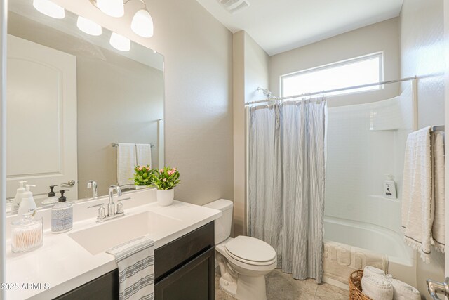 37903 W San Clemente St, Maricopa, AZ 85138 - bathroom featuring toilet, vanity, shower / bath combination with curtain, and tile patterned flooring
