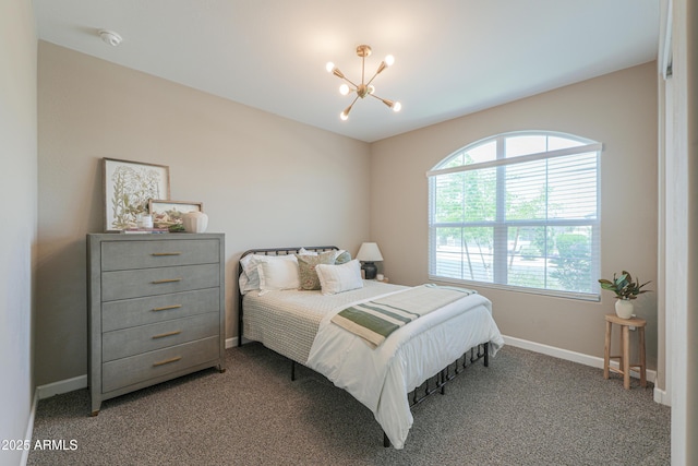 37903 W San Clemente St, Maricopa, AZ 85138 - carpeted bedroom featuring a chandelier and baseboards