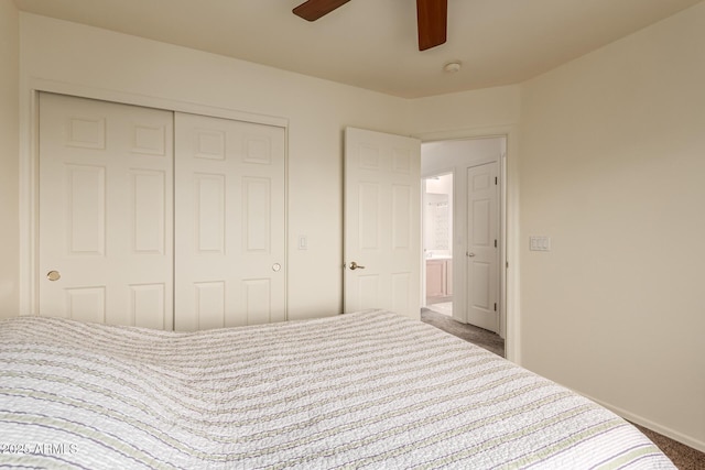 carpeted bedroom with ceiling fan and a closet