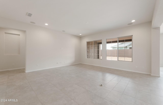 view of tiled spare room