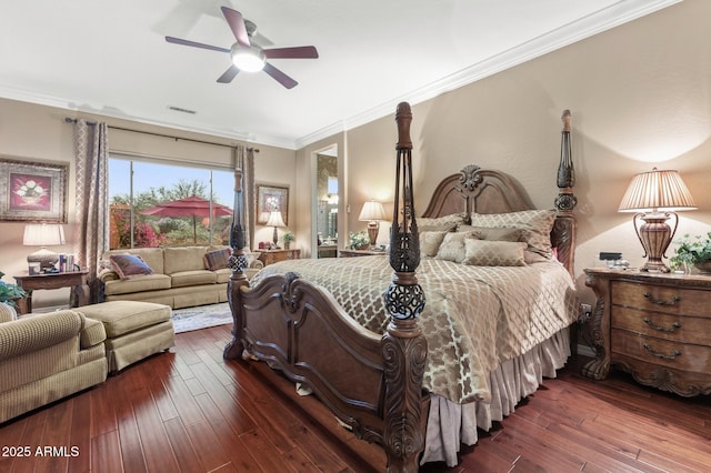 bedroom with ceiling fan, dark hardwood / wood-style flooring, and ornamental molding