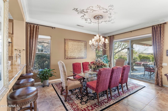 dining space with ornamental molding, light tile patterned floors, and a chandelier