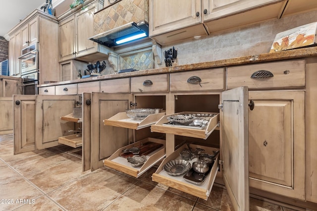 interior details with stainless steel double oven