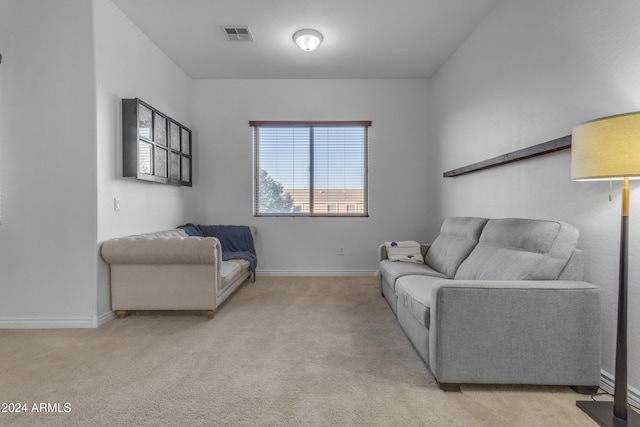 interior space featuring light colored carpet