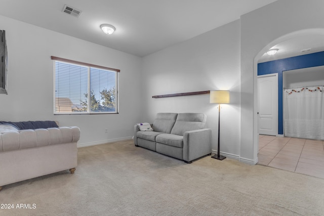 living room with light colored carpet