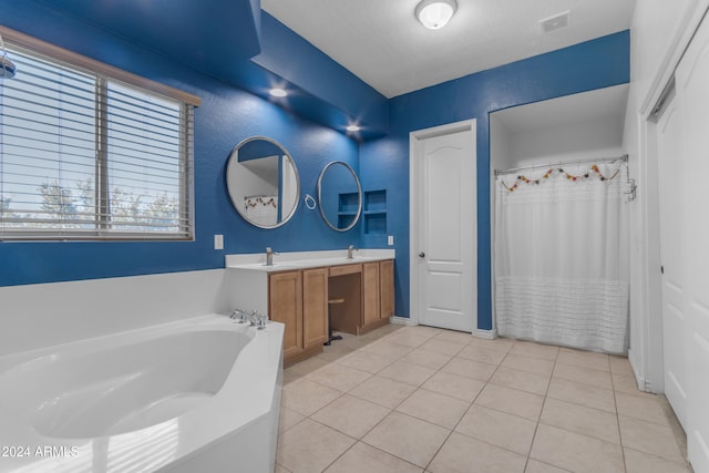 bathroom with vanity, separate shower and tub, and tile patterned flooring