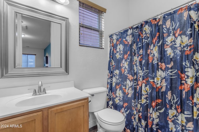 964 W Saguaro Ln, San Tan Valley, AZ 85143 - bathroom featuring toilet, vanity, and a shower with shower curtain