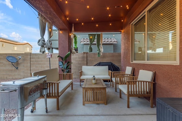 view of patio with an outdoor living space and grilling area