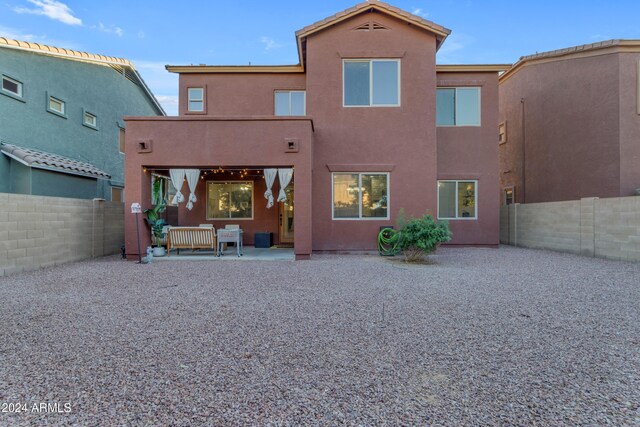 964 W Saguaro Ln, San Tan Valley, AZ 85143 - back of house with stucco siding, a patio, and a fenced backyard