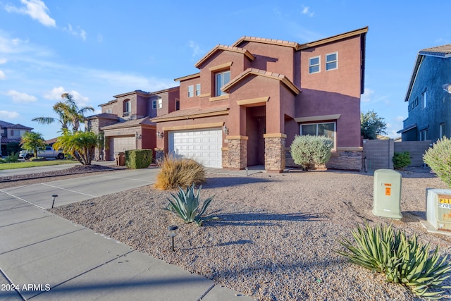 view of front of home with a garage