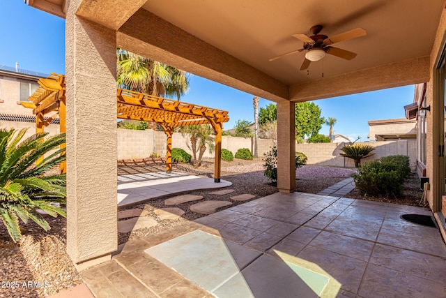 view of patio featuring ceiling fan and a pergola