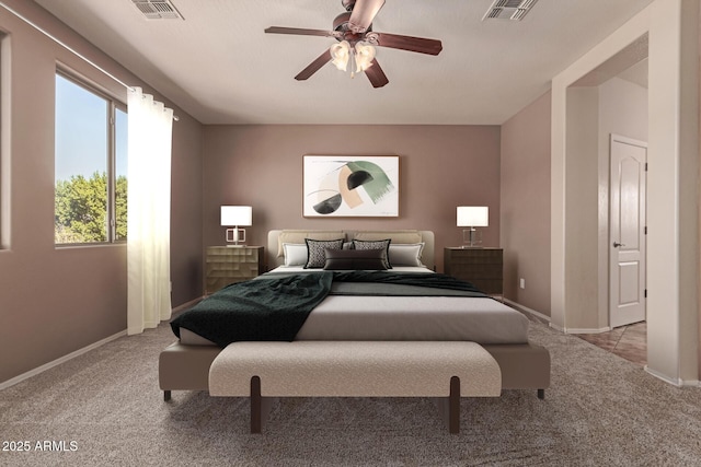 bedroom featuring light colored carpet and ceiling fan