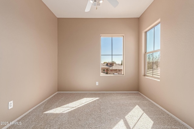 carpeted empty room with ceiling fan