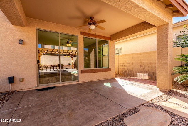 view of patio with ceiling fan