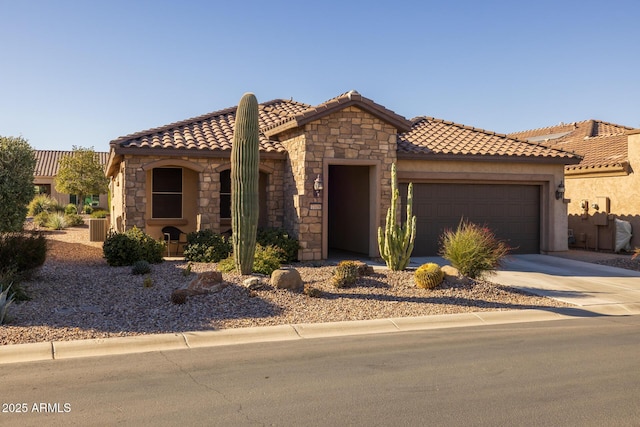 mediterranean / spanish house with central AC and a garage