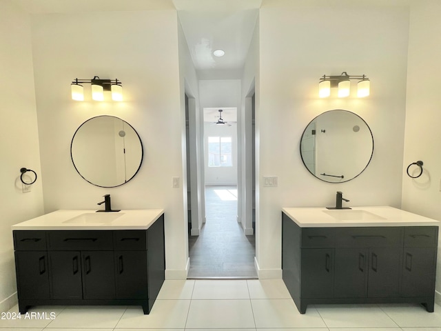 bathroom with tile patterned floors, ceiling fan, and vanity