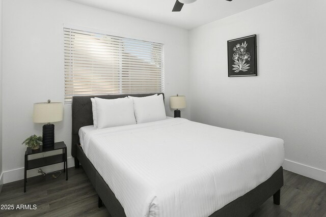 bedroom with baseboards, a ceiling fan, and wood finished floors