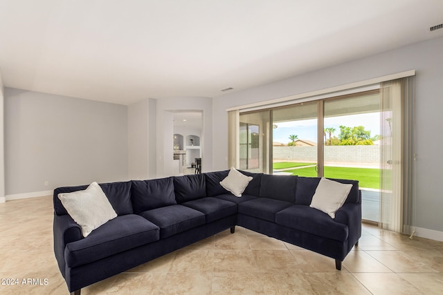 living room featuring light tile patterned floors