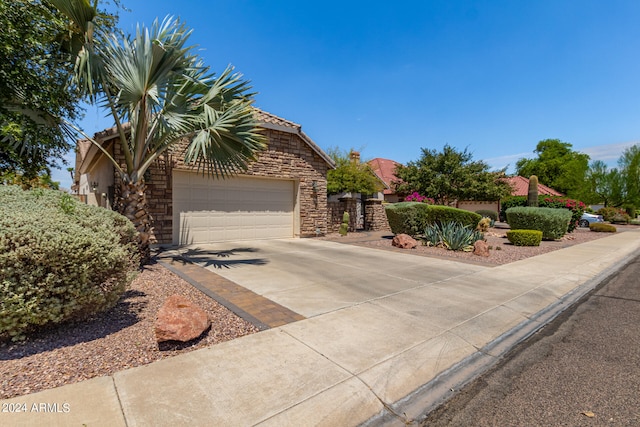 view of front of home featuring a garage