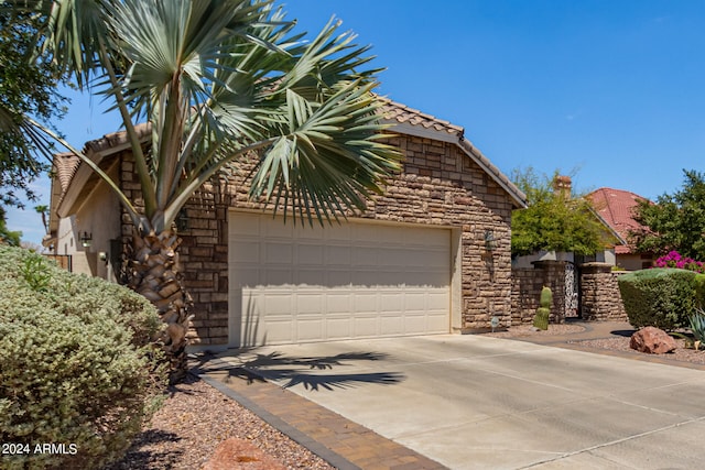 exterior space with a garage