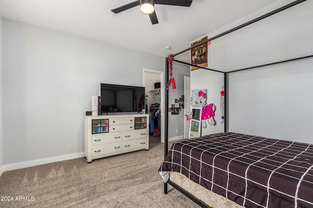 bedroom with ceiling fan and carpet