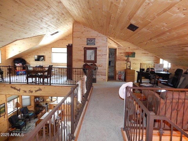 2372 Summer Loop, Forest Lakes, AZ 85931 - additional living space with vaulted ceiling, wooden walls, healthy amount of natural light, wood ceiling, and carpet