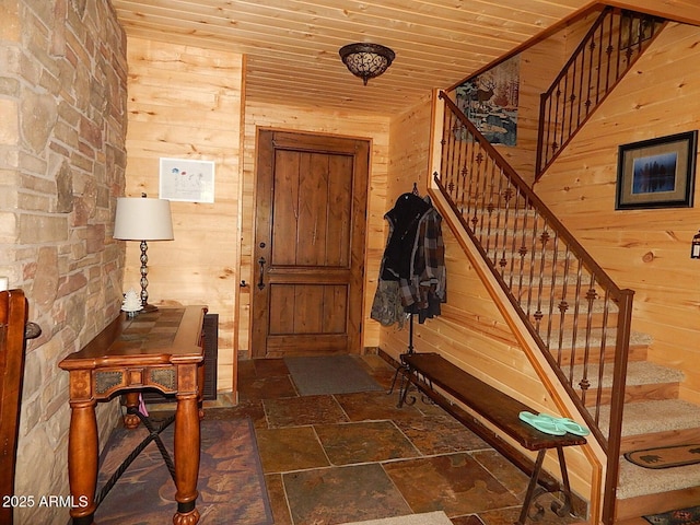 2372 Summer Loop, Forest Lakes, AZ 85931 - entryway featuring wood walls, stone tile flooring, stairs, and wood ceiling