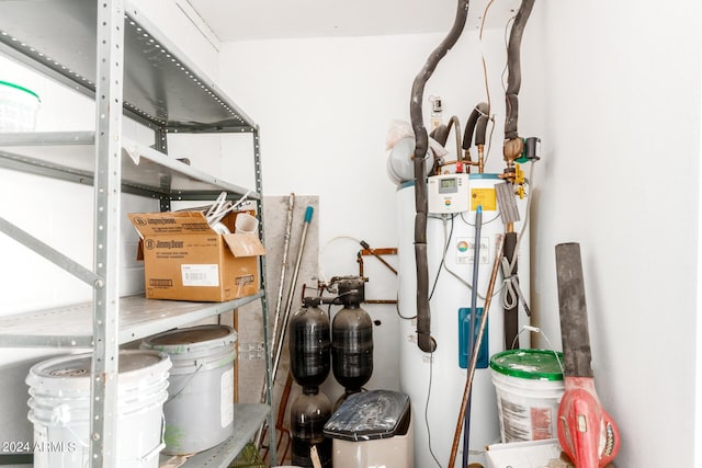 utility room with water heater