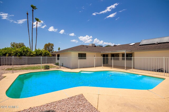 view of pool with a fenced backyard and a fenced in pool