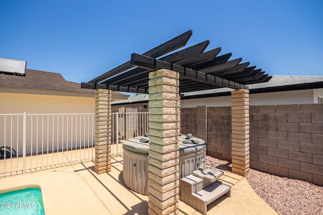 view of patio with fence and a pergola