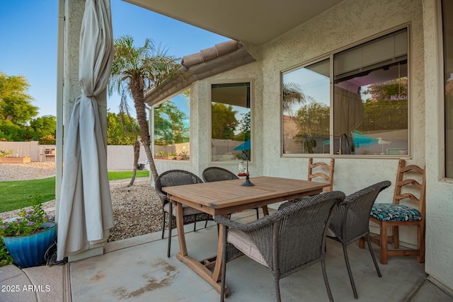 view of patio / terrace with fence and outdoor dining space