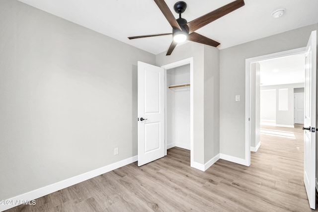 unfurnished bedroom featuring a closet, ceiling fan, and light hardwood / wood-style floors