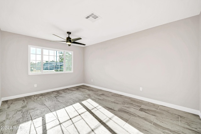 spare room featuring ceiling fan