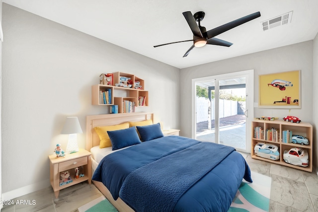 bedroom with ceiling fan, light hardwood / wood-style floors, and access to exterior