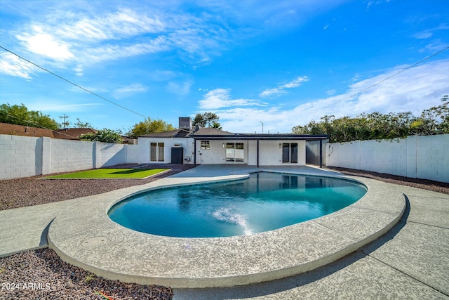 view of pool featuring a patio area