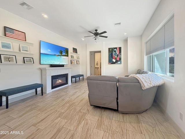 living room with ceiling fan