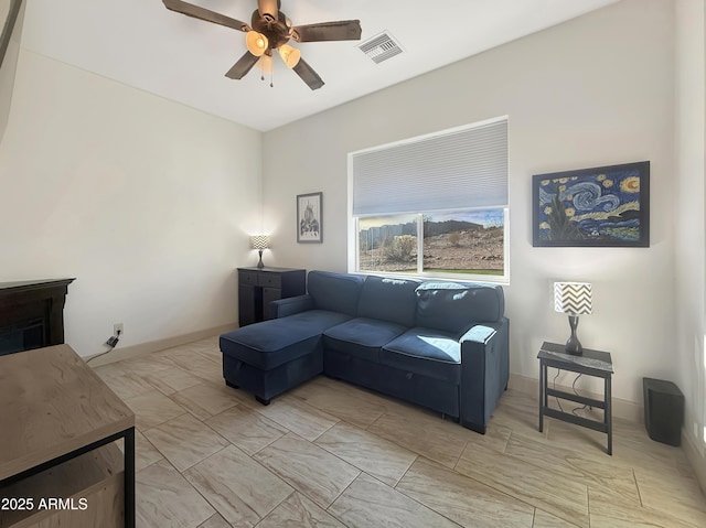 living room featuring ceiling fan