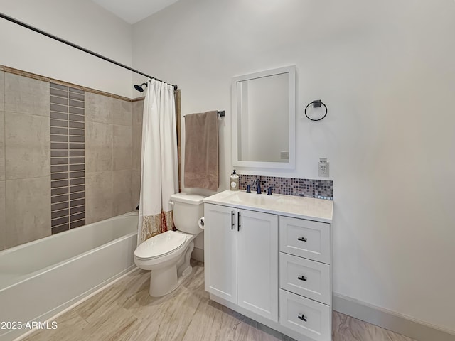 full bathroom with tasteful backsplash, vanity, toilet, and shower / bath combo with shower curtain