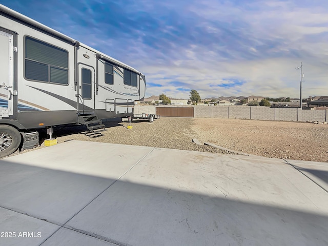 view of side of property featuring a patio area