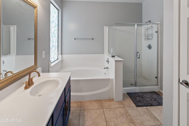 bathroom with shower with separate bathtub, vanity, tile patterned floors, and plenty of natural light