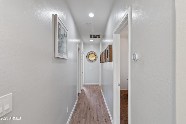 hallway featuring light wood-type flooring