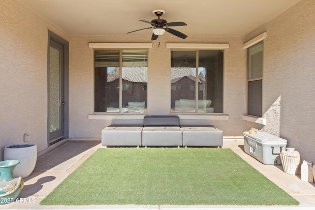 view of patio / terrace featuring ceiling fan and outdoor lounge area