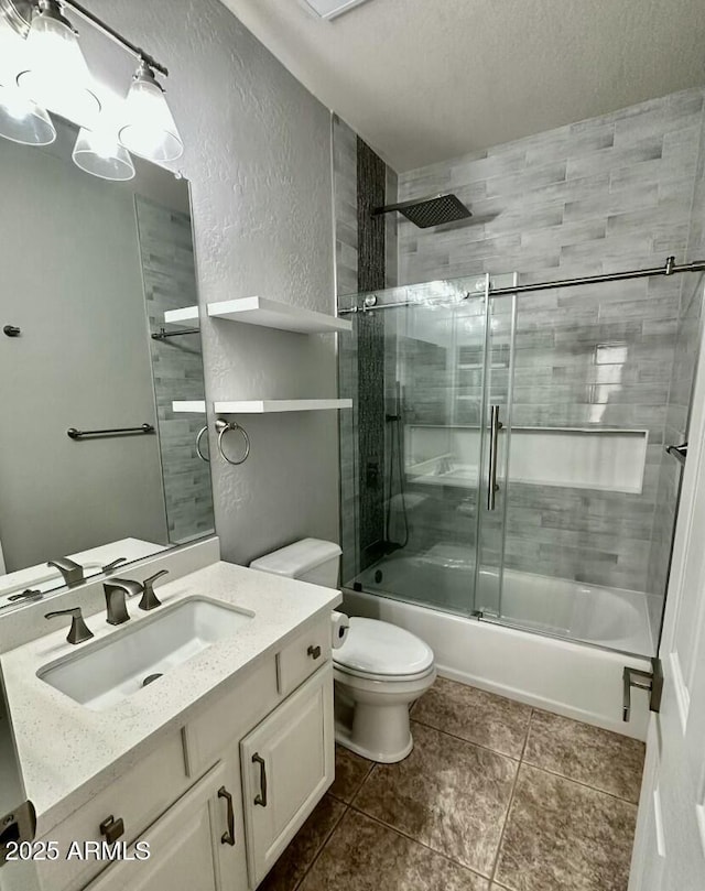 702 E Capricorn Way, Chandler, AZ 85249 - full bathroom featuring toilet, vanity, bath / shower combo with glass door, a textured wall, and tile patterned floors