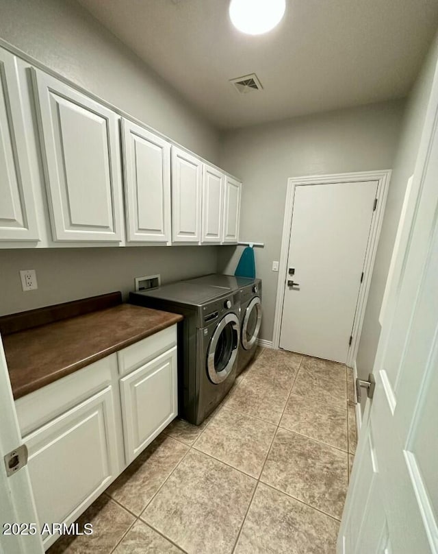 702 E Capricorn Way, Chandler, AZ 85249 - washroom featuring cabinet space, independent washer and dryer, and light tile patterned flooring
