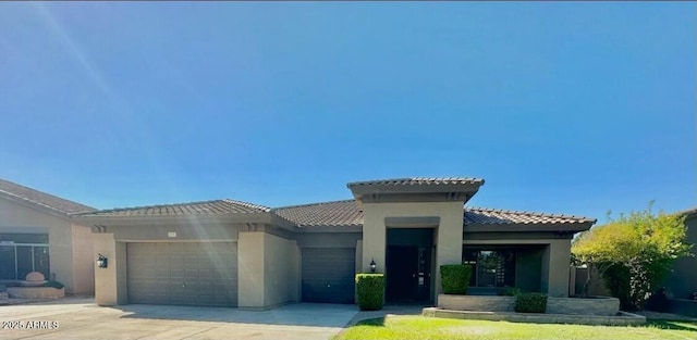 702 E Capricorn Way, Chandler, AZ 85249 - view of front of home featuring a garage, stucco siding, driveway, and a tile roof