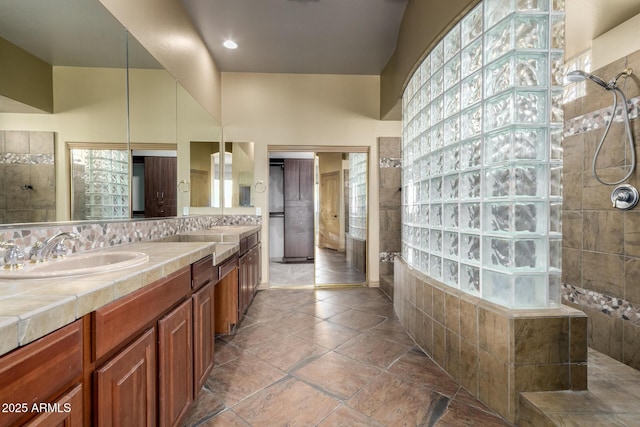 702 E Capricorn Way, Chandler, AZ 85249 - bathroom featuring double vanity and a walk in shower