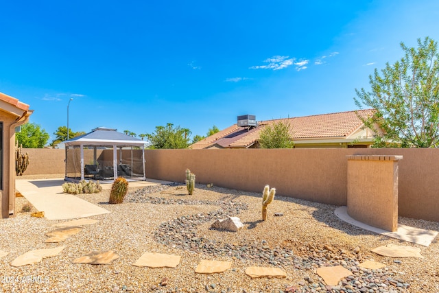 view of yard with a patio area and a gazebo