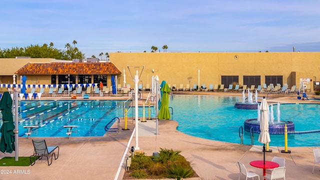 view of pool featuring a patio area and pool water feature