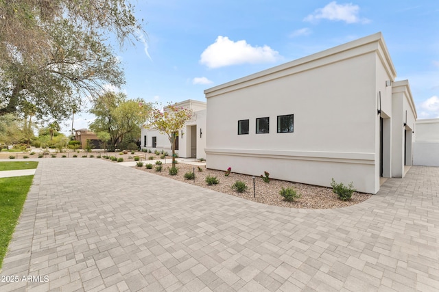 9611 E Clinton St, Scottsdale, AZ 85260 - view of side of property with stucco siding